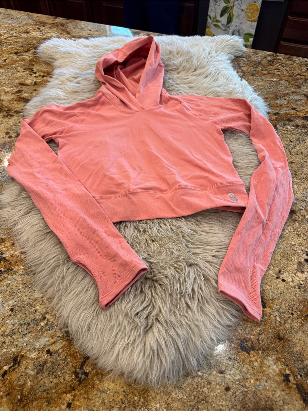 FP Movement Cut out back hoodie. Lace like pattern size M/L. Coral color.